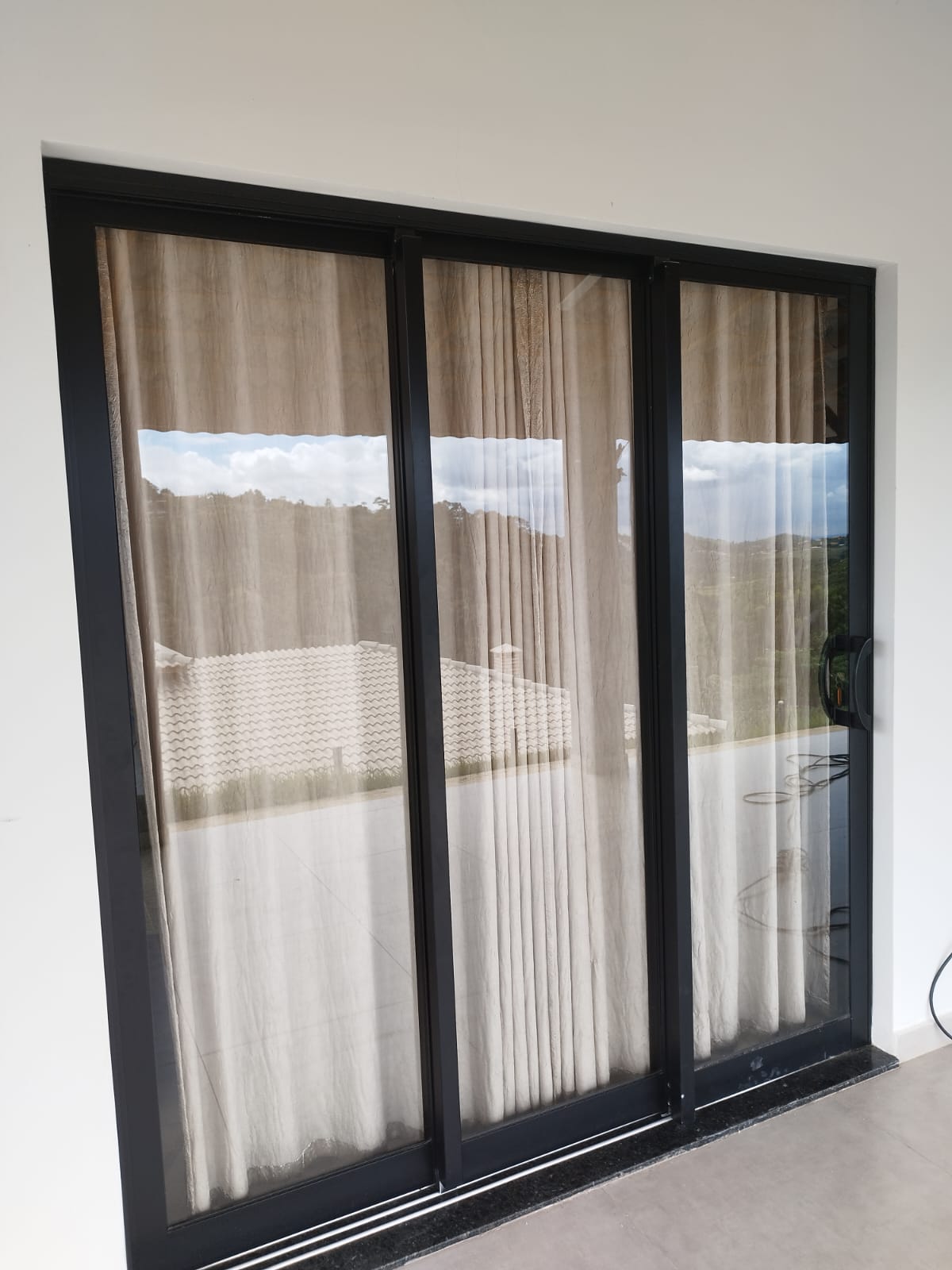 Porta de vidro deslizante para sala